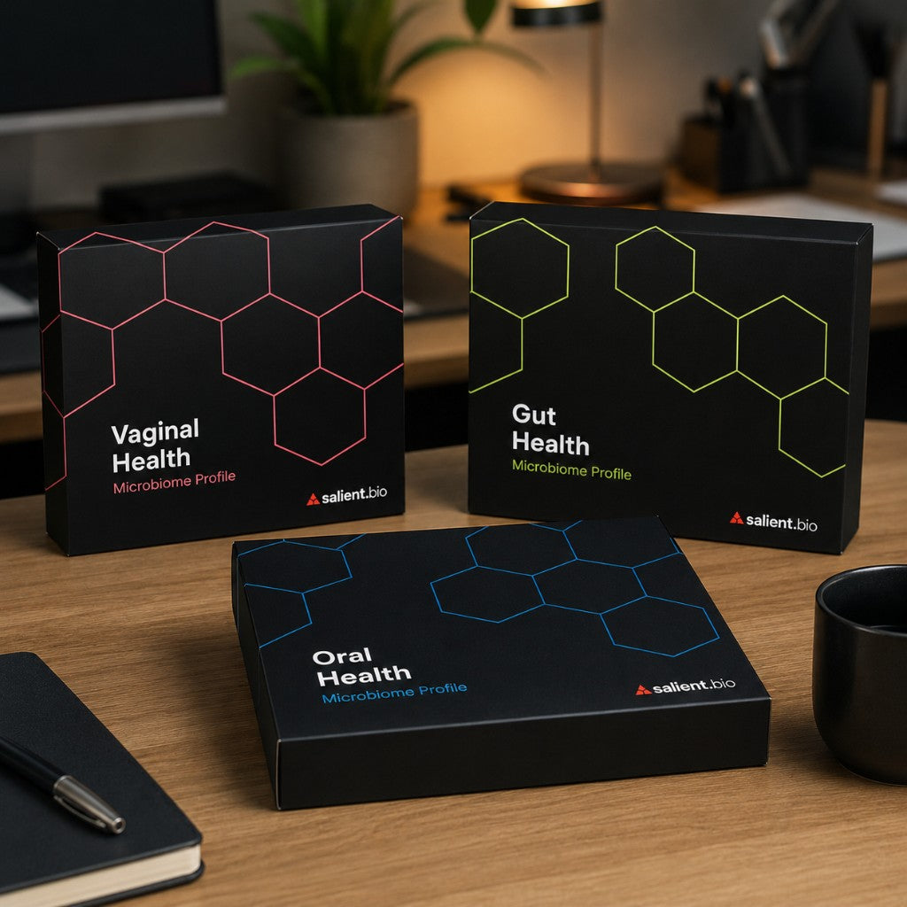 Salient oral, gut, and vaginal microbiome profile kit boxes on a desk